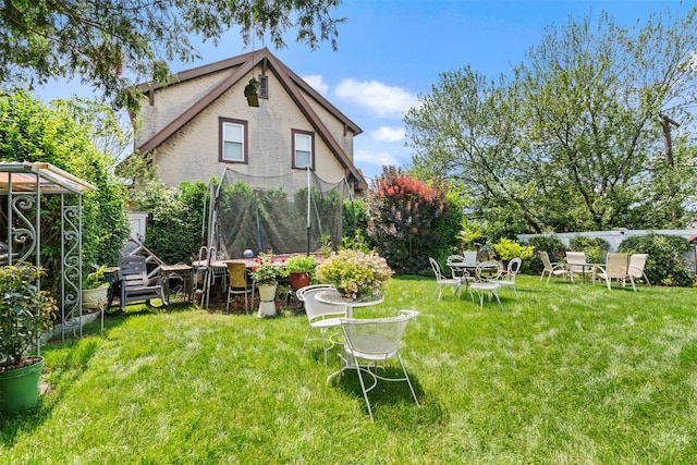 194 Valentine St, Yonkers, NY 10704 - view of yard with a trampoline