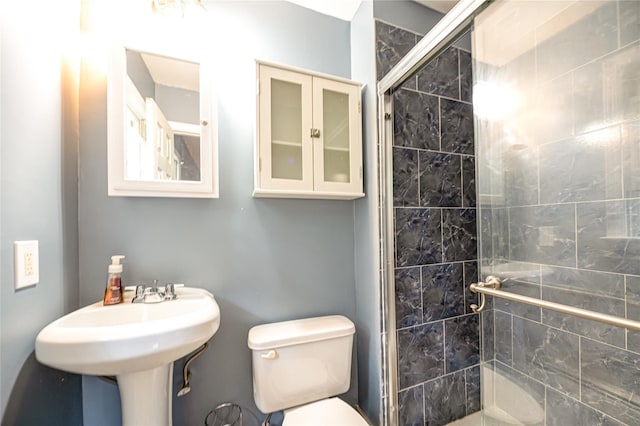 10 Valentine Rd, Shoreham, NY 11786 - bathroom featuring a stall shower and toilet