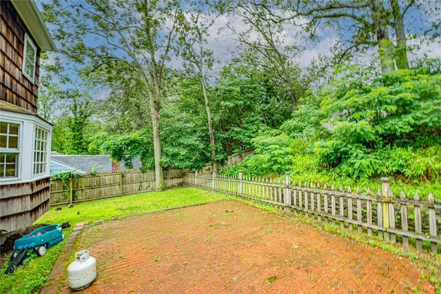 10 Valentine Rd, Shoreham, NY 11786 - fenced backyard with view of wooded area