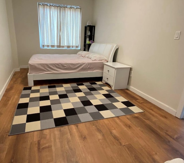 158-15 Union Tpke Unit 2D, Fresh Meadows, NY 11366 - bedroom with wood finished floors and baseboards