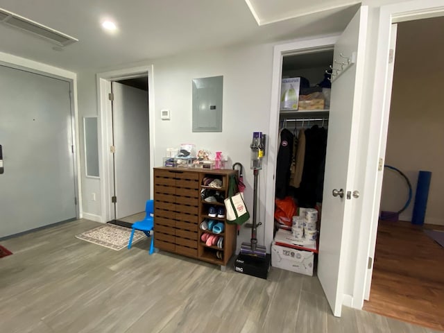 158-15 Union Tpke Unit 2D, Fresh Meadows, NY 11366 - bedroom with electric panel, wood finished floors, and a closet