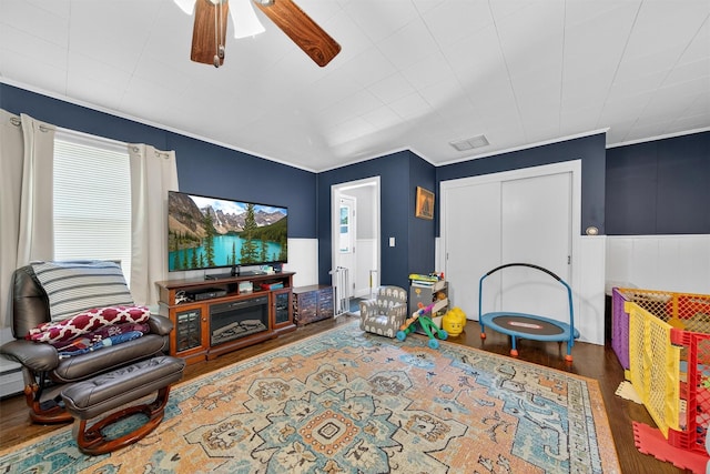 15 Cedar Ln, Cornwall, NY 12518 - living area with wood finished floors, ceiling fan, and wainscoting
