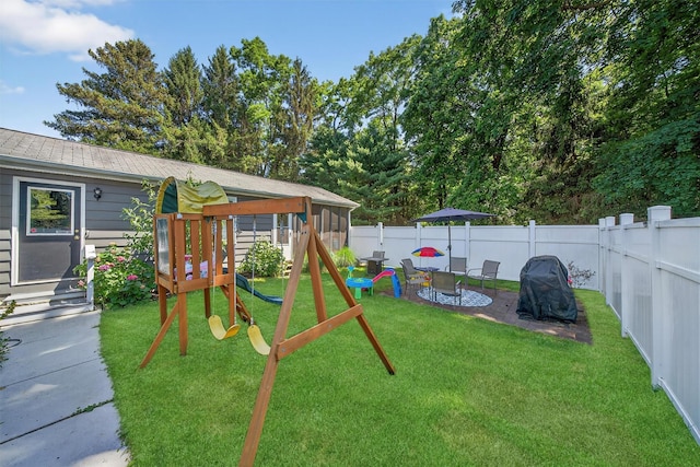 15 Cedar Ln, Cornwall, NY 12518 - fenced backyard with a playground and a patio
