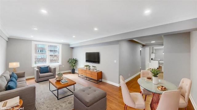 1133 Midland Ave Unit 3J, Bronxville, NY 10708 - living area with light wood finished floors, recessed lighting, and ornamental molding