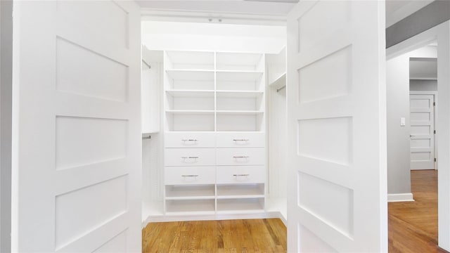 1133 Midland Ave Unit 3J, Bronxville, NY 10708 - walk in closet featuring light wood-style floors