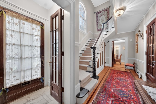 13 Garfield Pl, Poughkeepsie, NY 12601 - foyer with stairway and crown molding