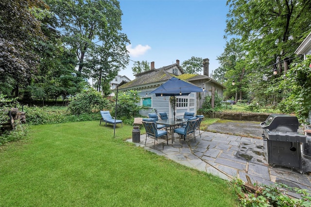 13 Garfield Pl, Poughkeepsie, NY 12601 - view of grassy yard with a patio