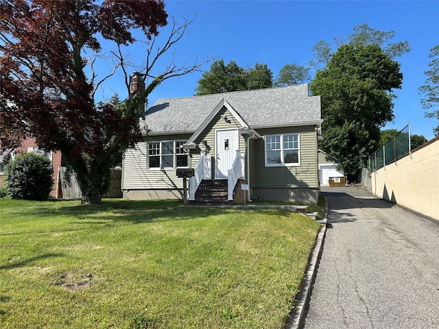 153 W Main St, Kings Park, NY 11754 - view of front of property featuring a chimney