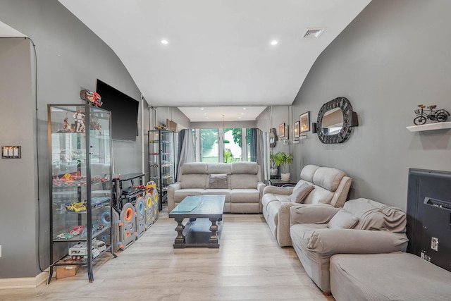 41 Linda St, Port Jefferson Station, NY 11776 - living area with lofted ceiling, light wood-style flooring, and recessed lighting