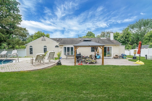 41 Linda St, Port Jefferson Station, NY 11776 - back of house featuring a gazebo, a patio area, a fenced backyard, and a chimney