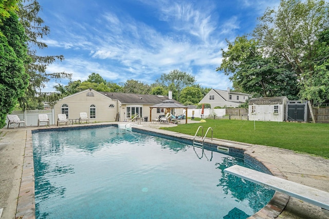 41 Linda St, Port Jefferson Station, NY 11776 - view of pool with a gazebo, a patio area, a shed, and a diving board