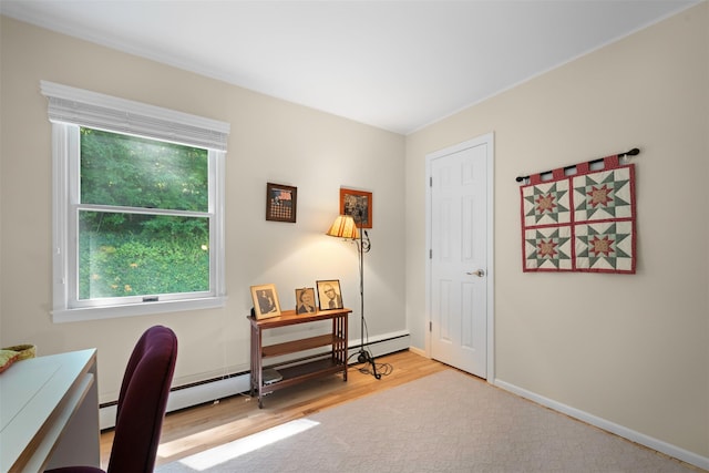 54 Bankside Dr, Centerport, NY 11721 - office area with wood finished floors, a baseboard heating unit, and baseboard heating