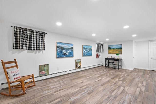 54 Bankside Dr, Centerport, NY 11721 - living area with wood finished floors, a baseboard radiator, and recessed lighting