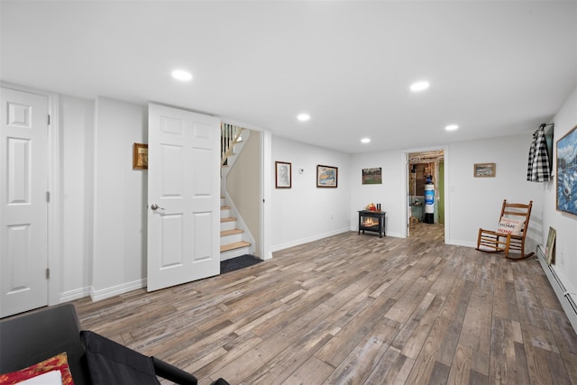 54 Bankside Dr, Centerport, NY 11721 - sitting room with stairs, recessed lighting, and wood finished floors