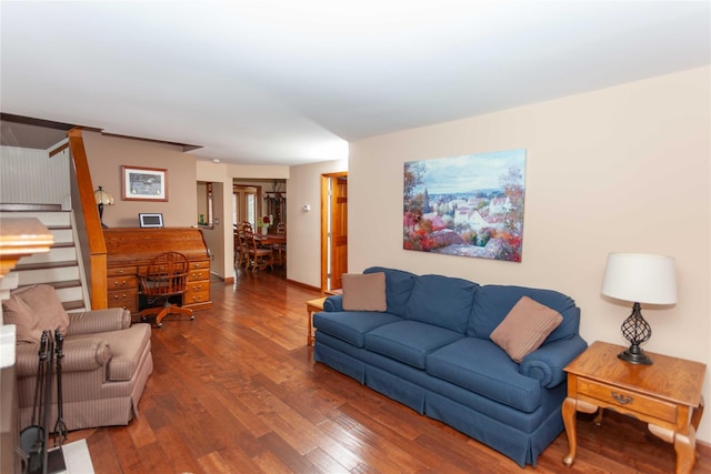 66 Parma Rd, Island Park, NY 11558 - living area featuring wood finished floors and stairway