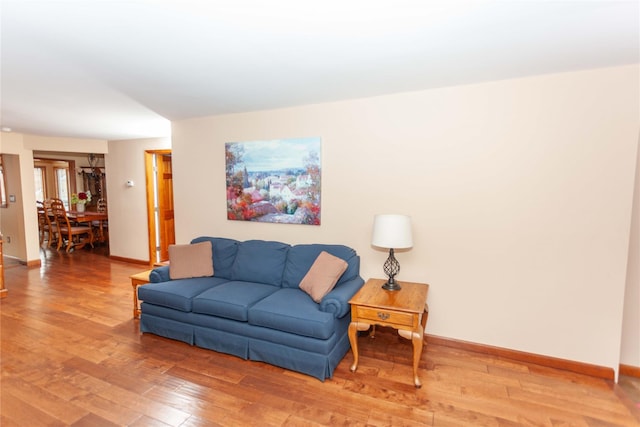66 Parma Rd, Island Park, NY 11558 - living room with light wood finished floors