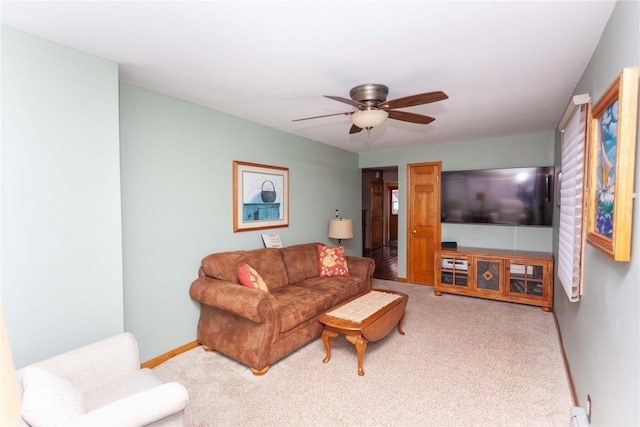 66 Parma Rd, Island Park, NY 11558 - carpeted living area featuring ceiling fan and baseboards