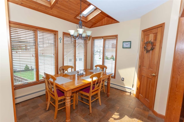 66 Parma Rd, Island Park, NY 11558 - dining room with a baseboard heating unit, a skylight, a chandelier, stone tile flooring, and vaulted ceiling