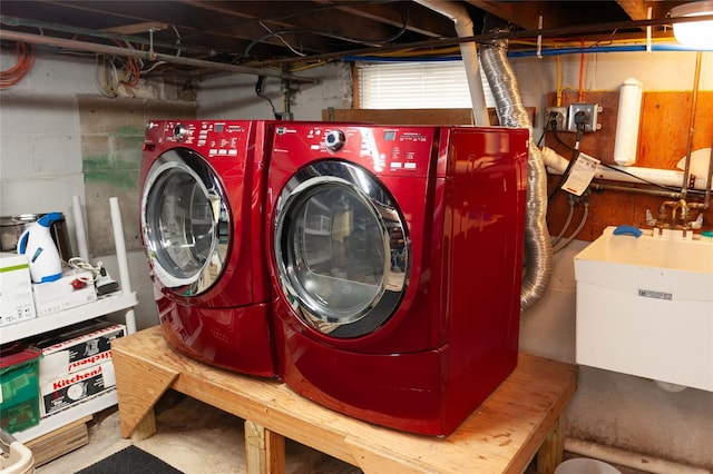 66 Parma Rd, Island Park, NY 11558 - laundry area with washer and clothes dryer
