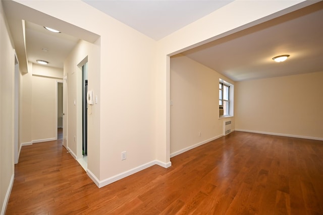 26-21 Union St Unit 1B, Flushing, NY 11354 - unfurnished room featuring wood finished floors and baseboards