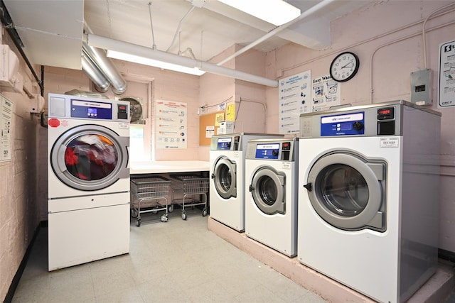 26-21 Union St Unit 1B, Flushing, NY 11354 - shared laundry room featuring washing machine and dryer and tile patterned floors