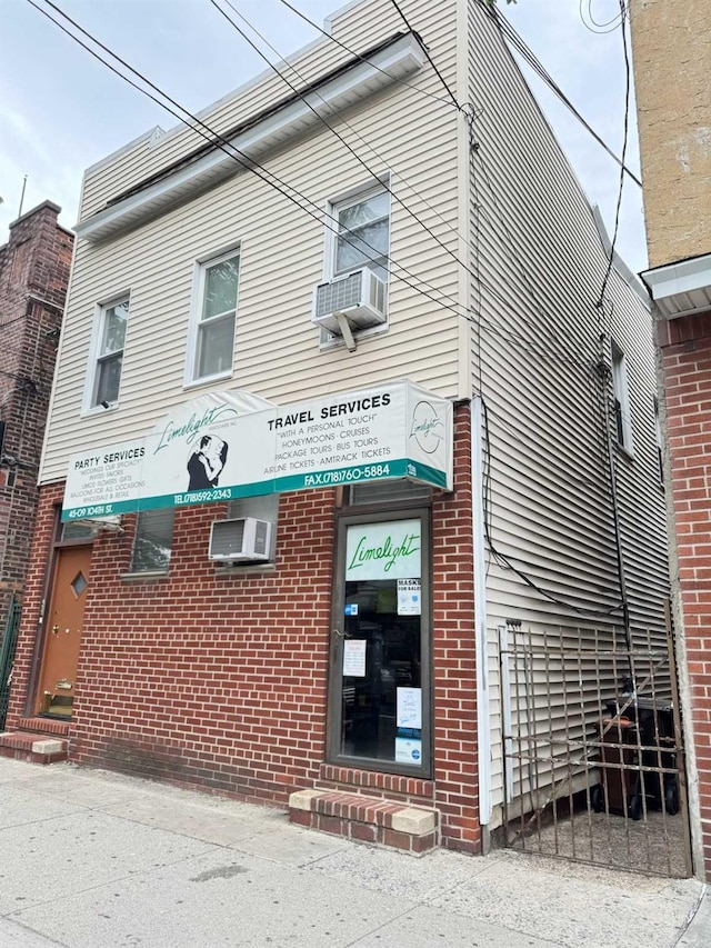 45-09 104th St, Corona, NY 11368 - view of building exterior with entry steps and cooling unit