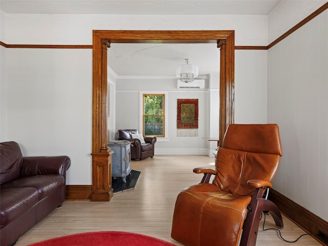 135 Washington Ave, Saugerties, NY 12477 - living area with an AC wall unit, wood finished floors, and crown molding