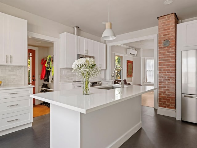 135 Washington Ave, Saugerties, NY 12477 - kitchen featuring stainless steel refrigerator, a wall mounted AC, tasteful backsplash, light countertops, and recessed lighting