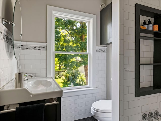 135 Washington Ave, Saugerties, NY 12477 - bathroom with tile walls, healthy amount of natural light, and vanity