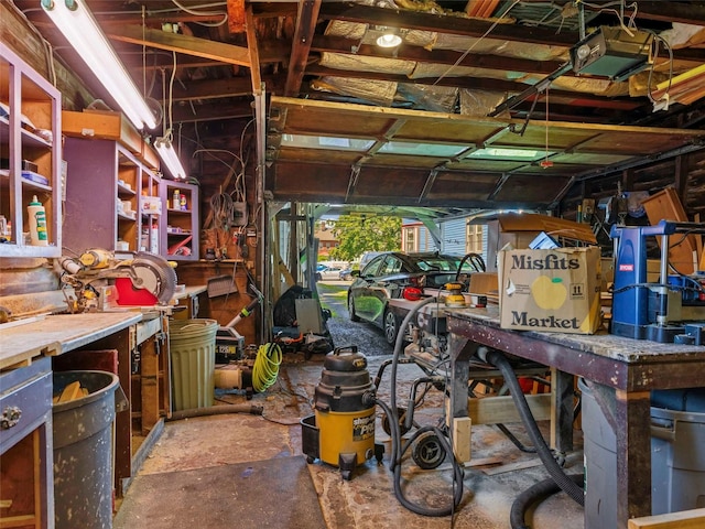 135 Washington Ave, Saugerties, NY 12477 - garage featuring a workshop area and a garage door opener