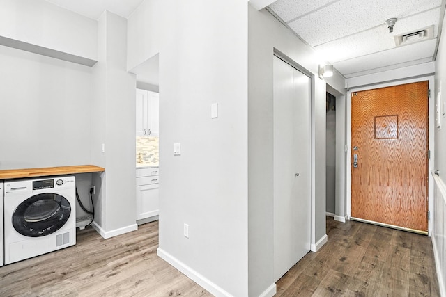 55 Mckinley Ave Unit D3-14, White Plains, NY 10606 - washroom featuring washer / clothes dryer and light wood-type flooring
