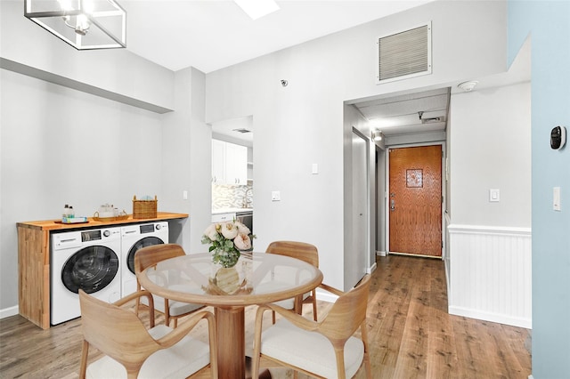 55 Mckinley Ave Unit D3-14, White Plains, NY 10606 - dining room with light wood finished floors and separate washer and dryer