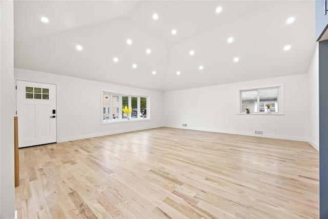 226-07 76th Rd, Bayside, NY 11364 - unfurnished living room featuring light wood finished floors, recessed lighting, and high vaulted ceiling
