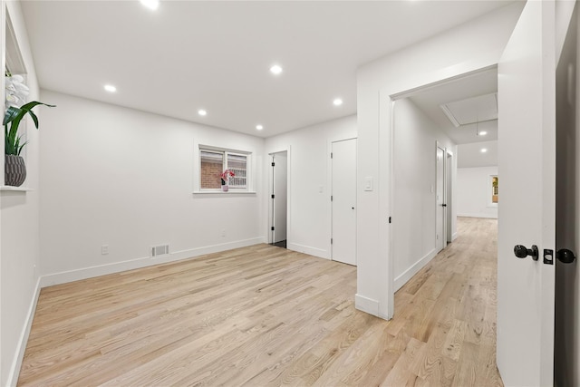226-07 76th Rd, Bayside, NY 11364 - empty room with attic access, light wood-style floors, and recessed lighting