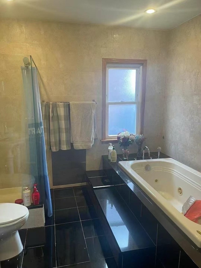 173-02 Effington Ave, Flushing, NY 11358 - bathroom featuring a tub with jets, tile patterned flooring, and a shower