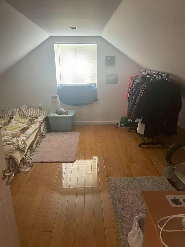 173-02 Effington Ave, Flushing, NY 11358 - bonus room featuring hardwood / wood-style flooring and lofted ceiling
