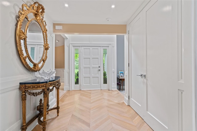 63 Sutton Pl, Manhasset, NY 11030 - foyer entrance with a decorative wall and wainscoting