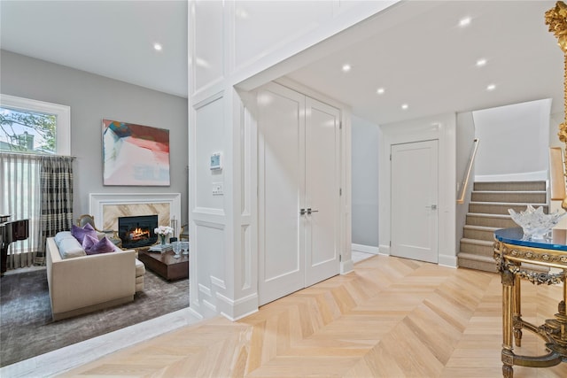 63 Sutton Pl, Manhasset, NY 11030 - hall with stairs and recessed lighting