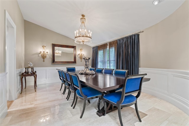 63 Sutton Pl, Manhasset, NY 11030 - dining area with a decorative wall, a chandelier, and a wainscoted wall