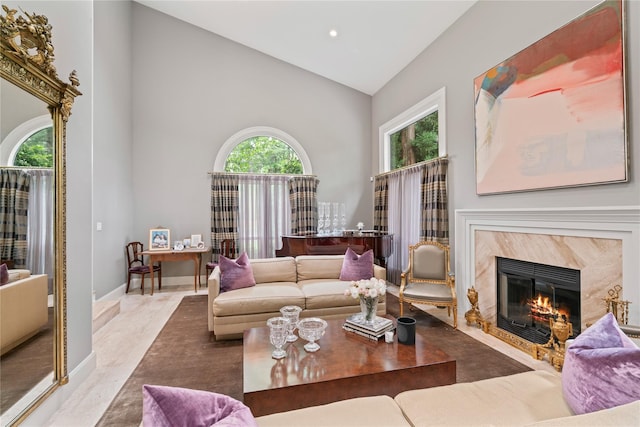 63 Sutton Pl, Manhasset, NY 11030 - living room with high vaulted ceiling and a high end fireplace