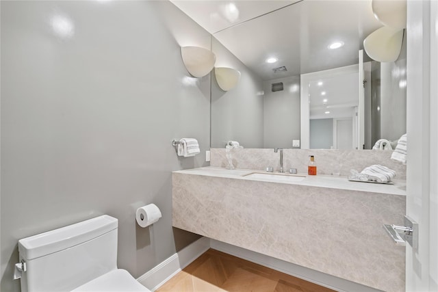 63 Sutton Pl, Manhasset, NY 11030 - bathroom featuring vanity and toilet