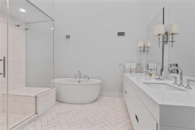 63 Sutton Pl, Manhasset, NY 11030 - bathroom with a stall shower, a freestanding tub, and double vanity