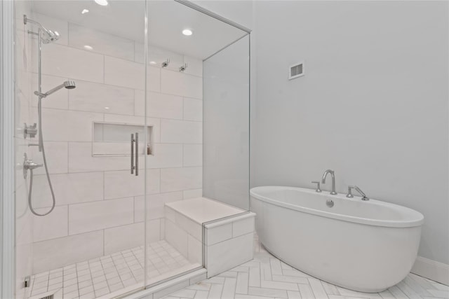 63 Sutton Pl, Manhasset, NY 11030 - full bath featuring a freestanding tub and a shower stall