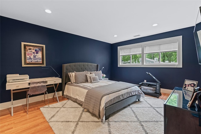 63 Sutton Pl, Manhasset, NY 11030 - bedroom with wood finished floors and recessed lighting