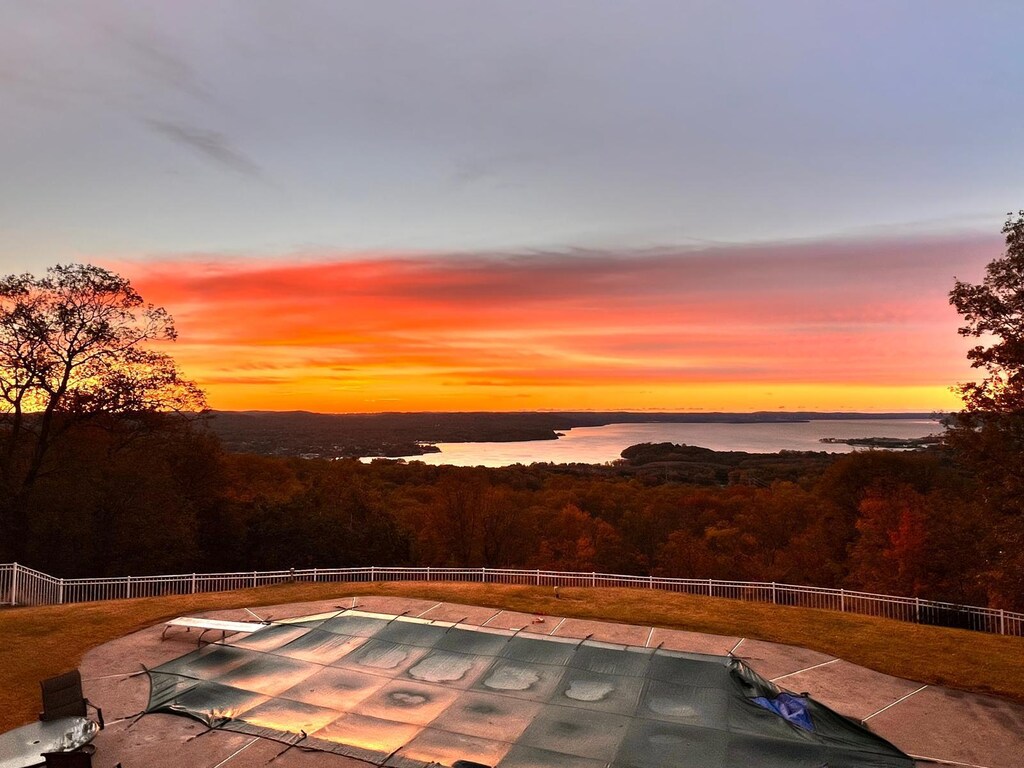 10 Soluri Ln, Tomkins Cove, NY 10986 - view of pool with a diving board, a water view, a fenced backyard, and a patio