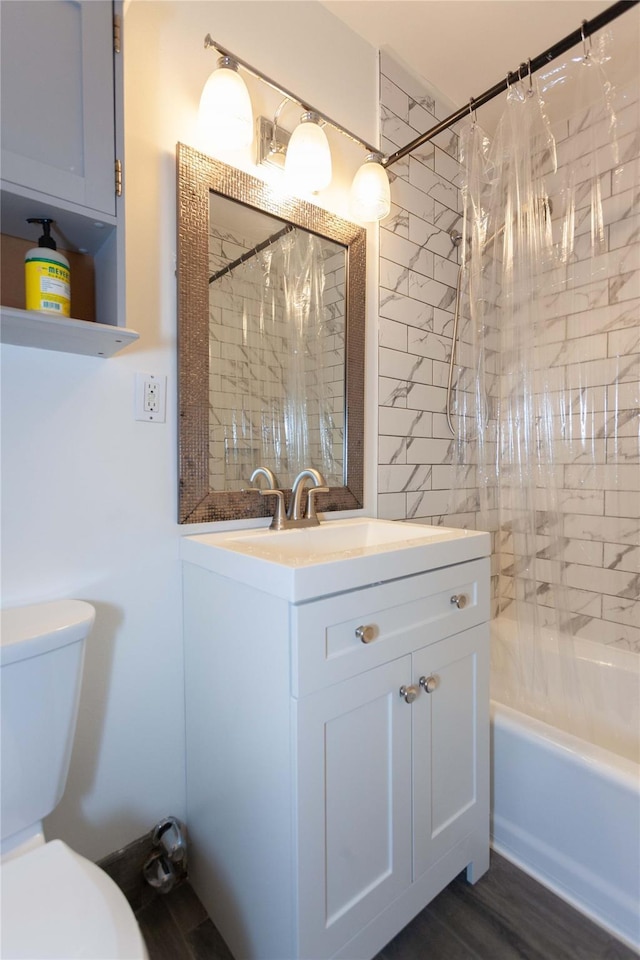 650 Shore Rd Unit 3C, Long Beach, NY 11561 - bathroom featuring vanity, shower / tub combo with curtain, and wood finished floors