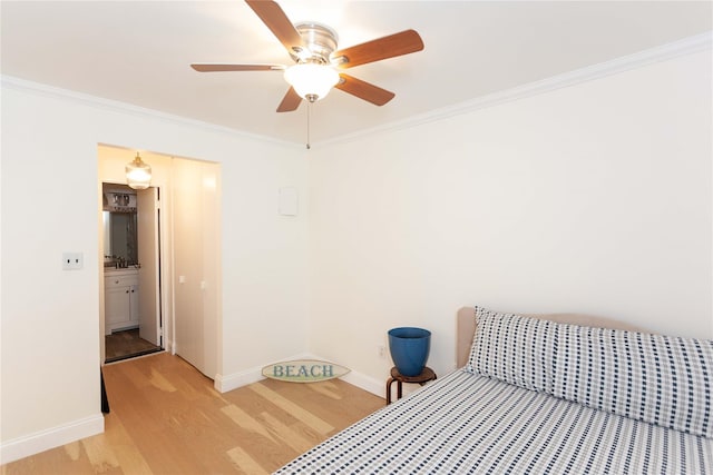 650 Shore Rd Unit 3C, Long Beach, NY 11561 - bedroom with light wood-style floors, crown molding, and a ceiling fan