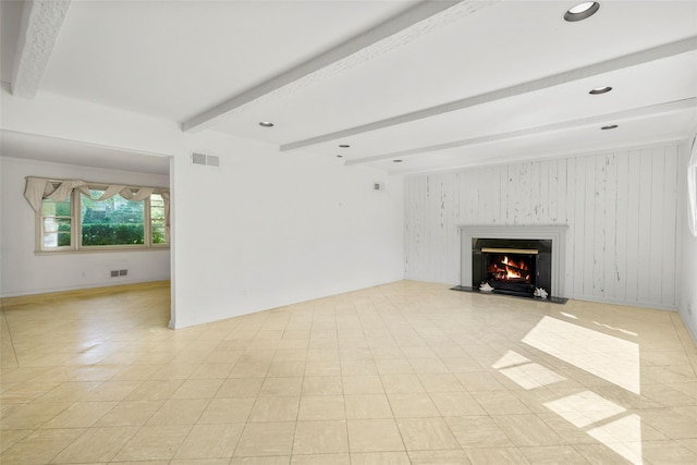 153 Waverly Rd, Scarsdale, NY 10583 - unfurnished living room with beamed ceiling, a lit fireplace, and recessed lighting