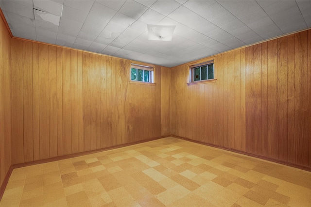 153 Waverly Rd, Scarsdale, NY 10583 - below grade area with light floors and wood walls