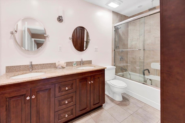 2 Fountain Ln Unit 3P, Scarsdale, NY 10583 - bathroom featuring combined bath / shower with glass door, double vanity, and tile patterned flooring